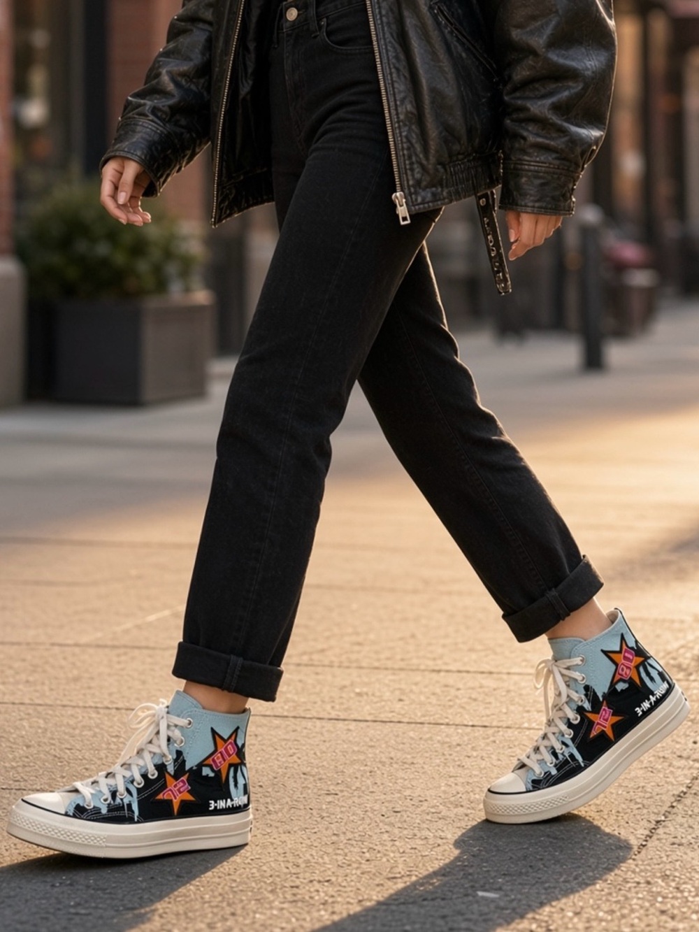 Converse Chuck Taylor High-Tops with White and Black Accents.
